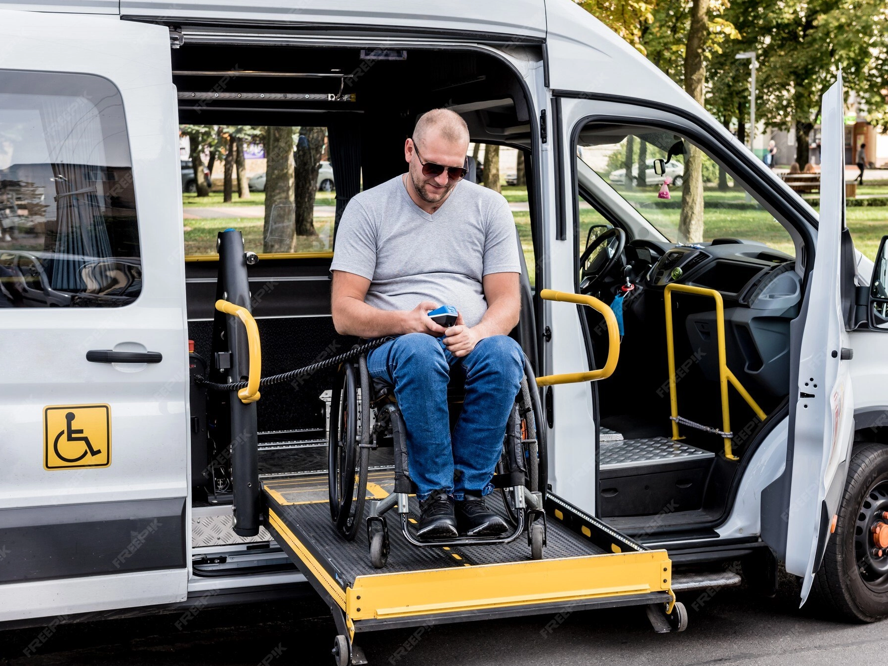 man-wheelchair-lift-vehicle-people-with-disabilities_179755-10354_1797_1348.png