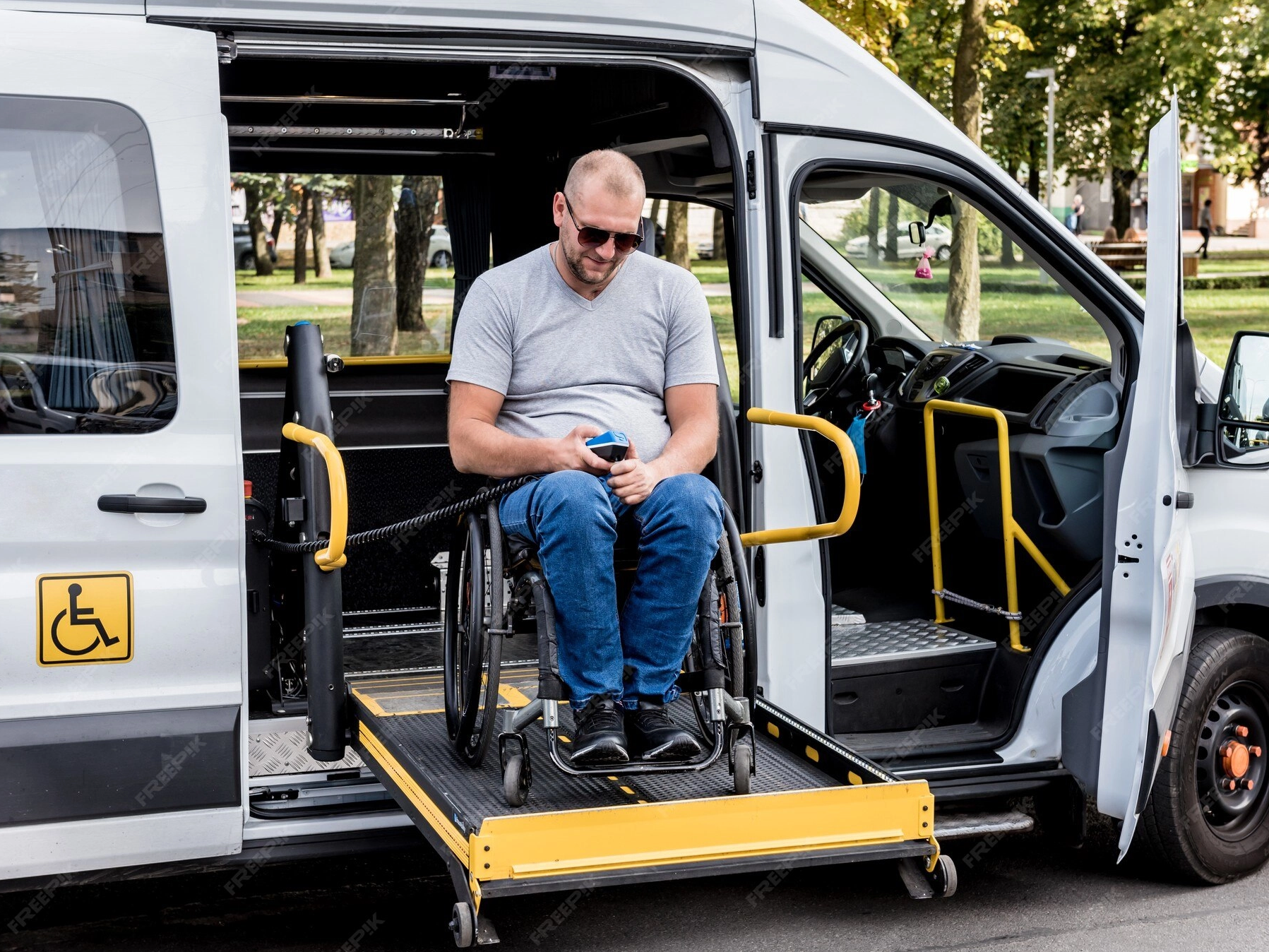 man-wheelchair-lift-vehicle-people-with-disabilities_179755-10354_1797_1348.png